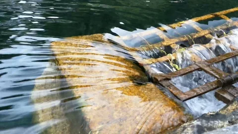 Water flowing down into a manhole Video stock 97079599
