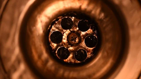 Water flowing down in old sink drain Stock Footage 85903739