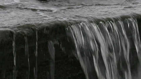 Water flowing down the rock Stock Footage 148646473