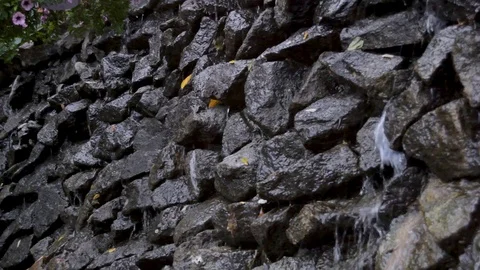 Water flowing down the rocky wall Stock Footage 119284957