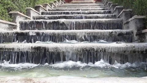 Water flowing down the steps from a cascading fountain Stock Footage 190398774