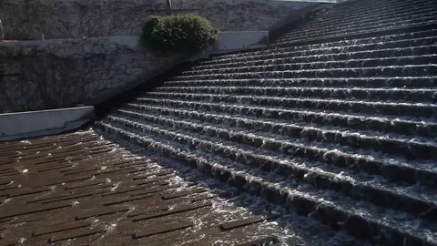 Water flowing down steps. Stockbeeldmateriaal 72532565