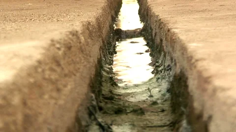 Water flowing down a storm drain timelapse Stock Footage 980434