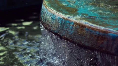 WATER FLOWING DOWN WATER FEATURE A Video stock 229611134