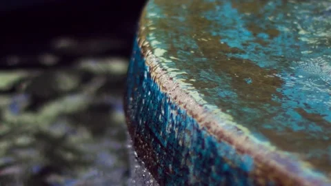 WATER FLOWING DOWN WATER FEATURE Video stock 229611136