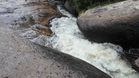 Water flowing downstream over rocks Stock-Footage 314146297