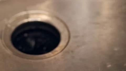 Water flowing into drain Stock Footage 82041889