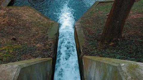 Water Flowing Fast Down Concrete Water Lock Spillway Canal at Hydro Power Plant Stock Footage 170956646
