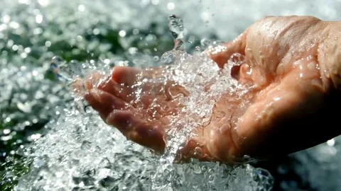 Water flowing into hands SLOW MOTION . People travel enjoying nature and life Stock Footage 270318489