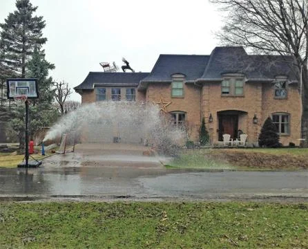 Water flowing from a hydrant Stock Photos