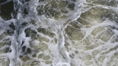 Water flowing inside the dam in slow motion. Flooded city river Stock Footage 118435234