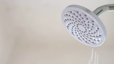 Water flowing from a leaking shower head Stock Footage 107592603
