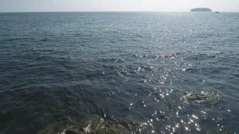 Water flowing into the ocean 스톡 동영상 310298985