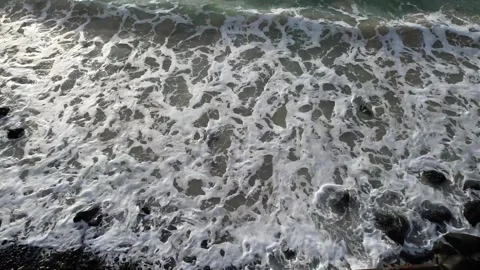 Water flowing into the ocean Video stock 310345152