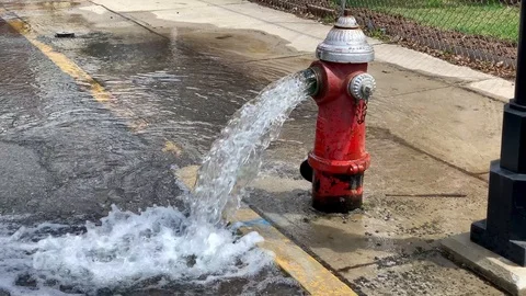 Water flowing from open fire hydrant Stock Footage 106218894