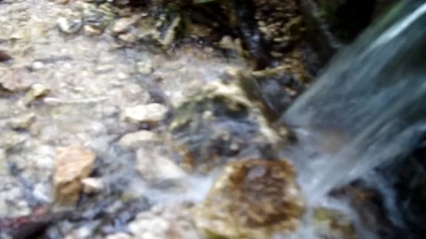 Water flowing out from mountain spring Stock-Footage 159177146