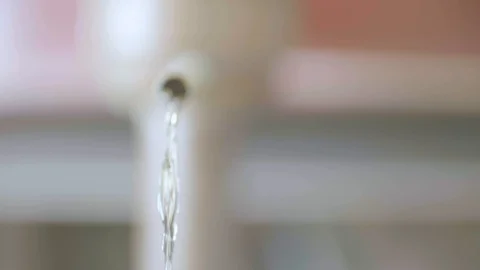 Water flowing out of a pipe Stock Footage 87801726