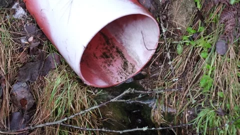 Water flowing out of a pipe Stock Footage 301218239