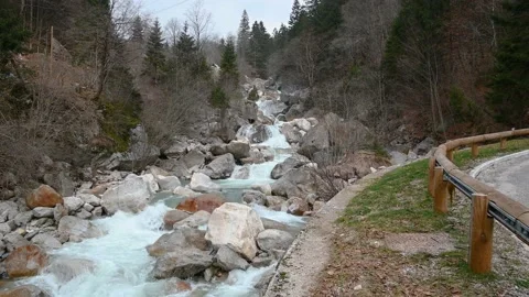 Water flowing over man made cascades in Alps mountains Stock Footage 150403240