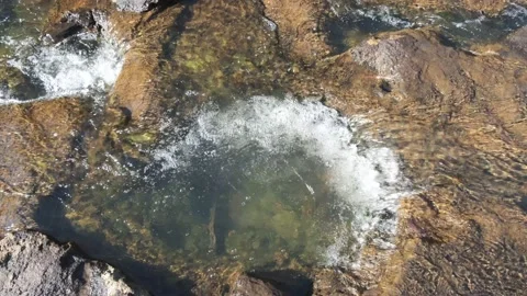 Water Flowing Over Rock Pools, 4K Stock Footage 134371313