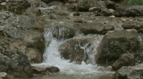 Water flowing over Rocks Stock Footage 706980
