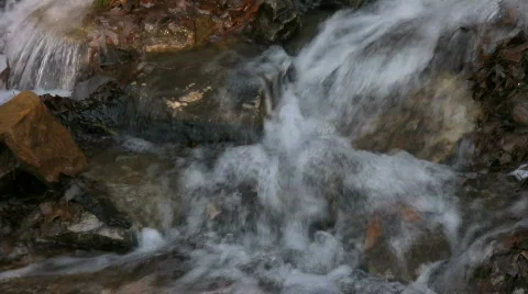 Water Flowing Over Rocks Stock Footage 846043