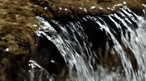 Water flowing over rocks Stock Footage 27363282