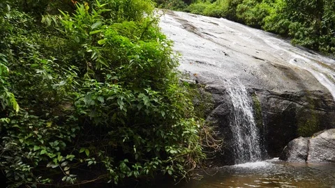 Water flowing over rocks Video stock 93394370