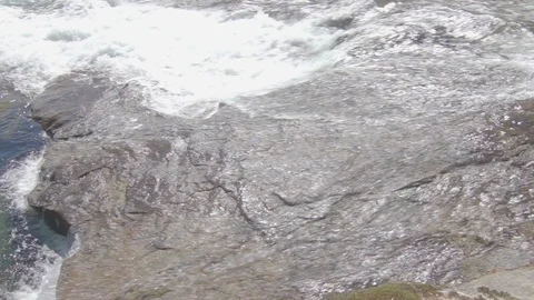Water flowing over rocks Stock Footage 110717549