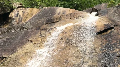 Water Flowing Over Rocks Stock Footage 137218024