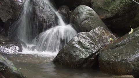 Water flowing over rocks Stock Footage 166645455