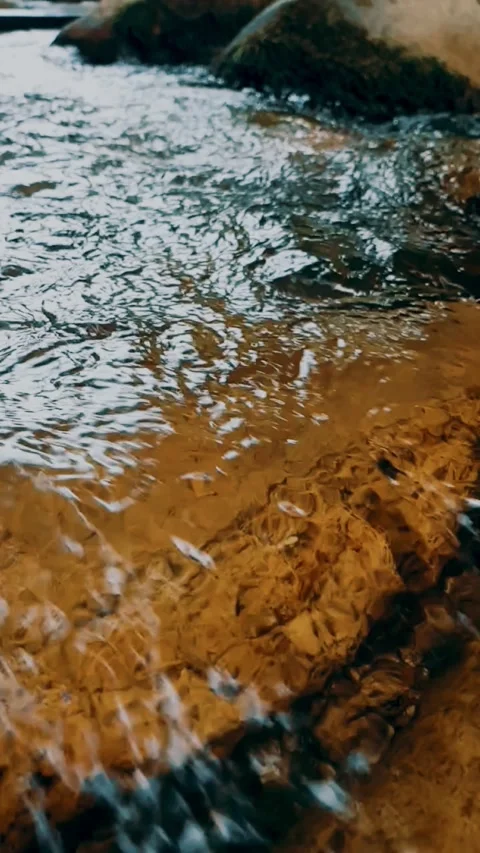 Water flowing over rocks Stock Footage 246138562