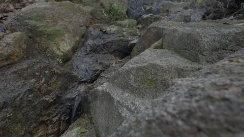 Water flowing over rocks Stock Footage 265002208