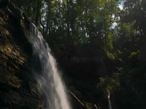Water flowing over rocks in small stream Stock Footage 77155739
