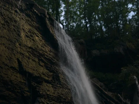 Water flowing over rocks in small stream Stock Footage 77158988