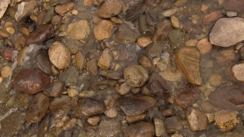 Water flowing over rocks in a stream 04 Stock Footage 83098513