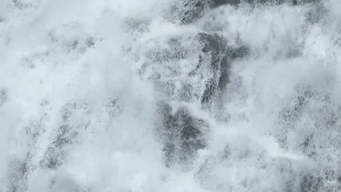 Water flowing over a rocky surface, abstract Stock Footage 334359901
