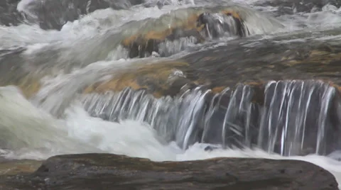Water flowing over sandstone Stock Footage 27339084