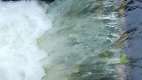 Water flowing pass check dam Stock Footage 109320573