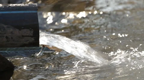 Water flowing from a pipe Stock Footage 43713074