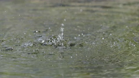 Water flowing into a pond Stock Footage 139242392