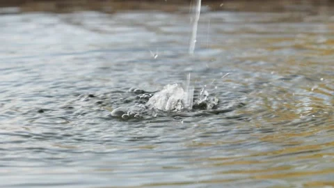 Water flowing into a pond Stock Footage 139341425