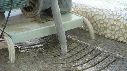 Water Flowing From Pool Cleaning Equipment Onto Wet Stone Surface Stock Footage 345614942