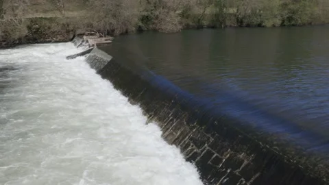 Water flowing rapidly on river cascade Видео 150896837