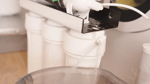 Water Flowing from the Reverse Osmosis System During a Test Flush of the New Stock Footage 296568270