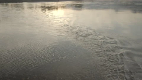 Water Flowing with Ripples on Surface Slow-Mo Stock Footage 164328926
