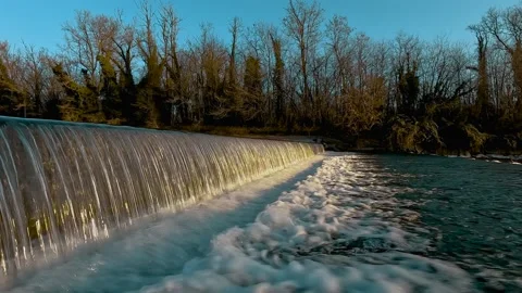 Water flowing into the river Stock Footage 234837939