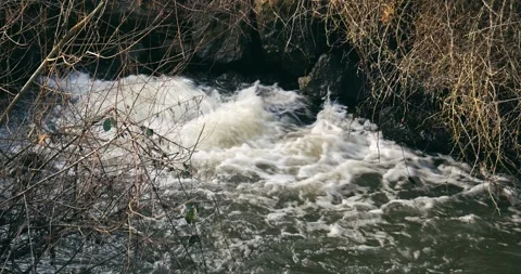 Water flowing into the river Video stock 242848507