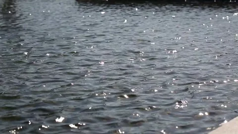 Water flowing into the river Video stock 310079518