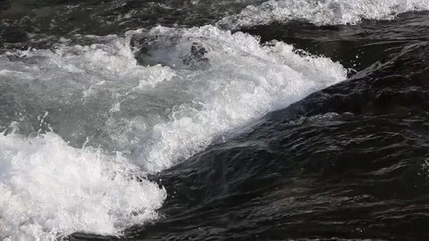 Water flowing in the river in spring Stock Footage 75718226